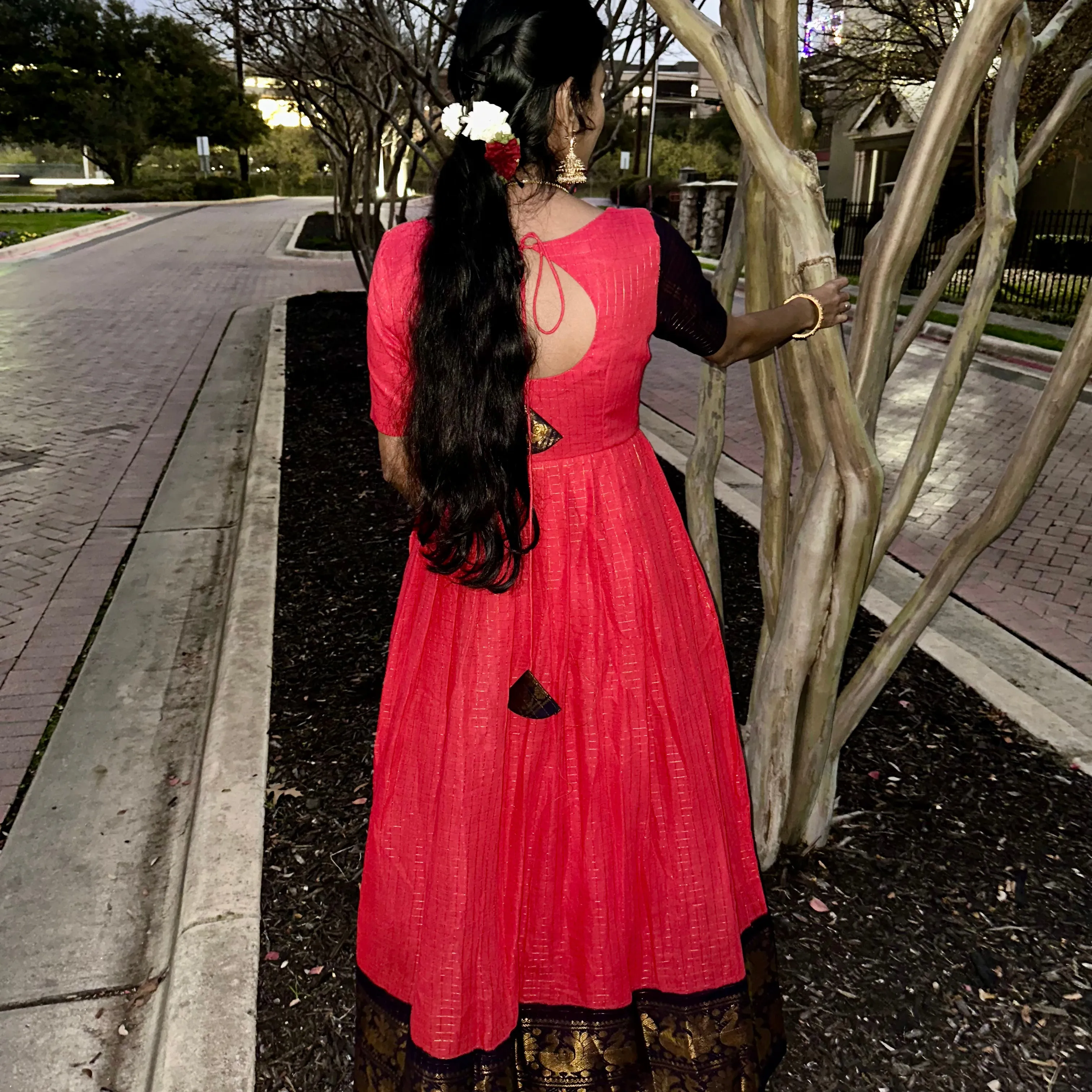 Elegance Redefined: Pink Sungudi Gown with Stylish Pot Neck